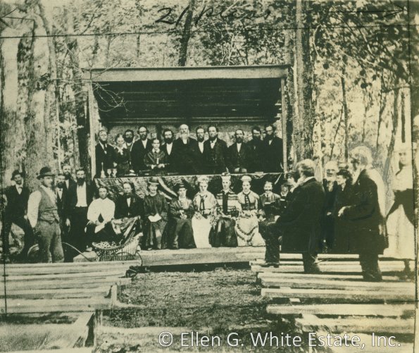 Eagle Lake, Minnesota, camp meeting, 1875, James and Ellen White, Uriah Smith and others under the canopy.